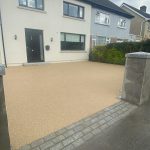 Resin bound driveway completed with granite cobbles steps walls and caps